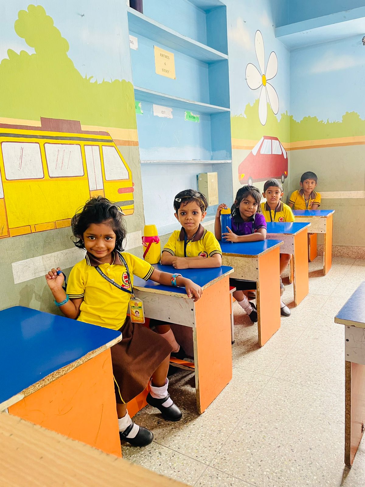 Students enjoying daily activities at Kiddies Montessori